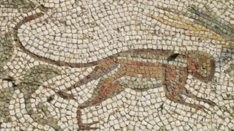 Representación de un mono en un mosaico de una villa romana